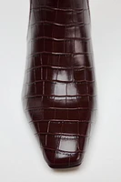 BOTTES À TALONS FINS AVEC RELIEF