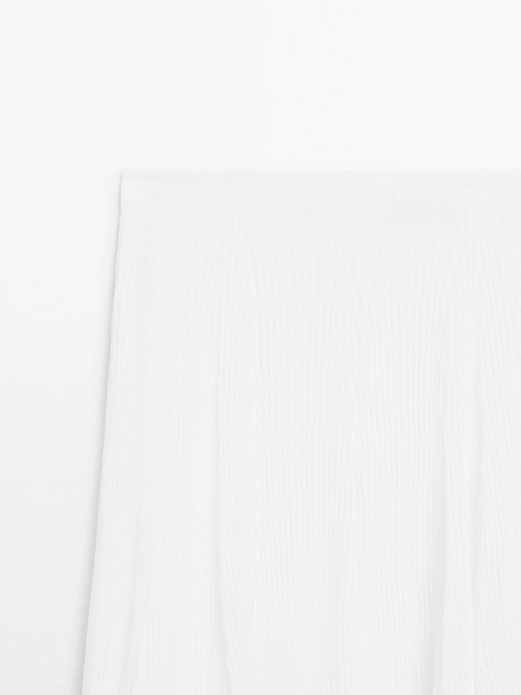 Pleated skirt with godet detail