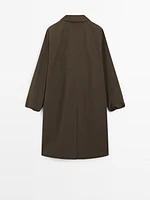 Technical fabric trench coat with button detail