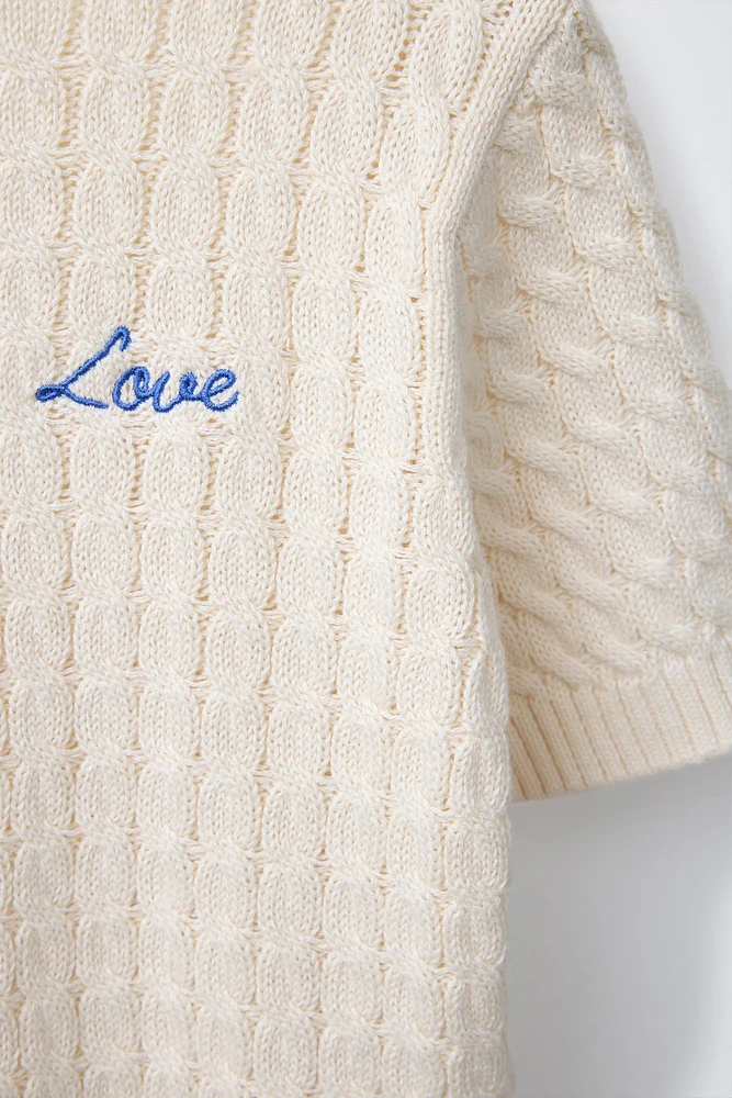 PULL EN MAILLE À TORSADES