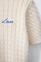 PULL EN MAILLE À TORSADES