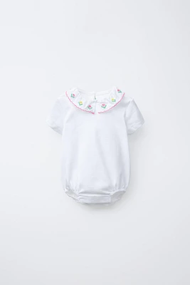 EMBROIDERED NECK BODYSUIT