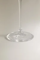 CRYSTALLINE FLUTE GLASS WITH RAISED DESIGN