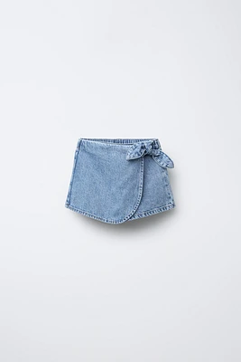 JUPE-SHORT EN JEAN TAILLE HAUTE À LACETS