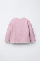 VESTE GAUFRÉE À BOUTONS