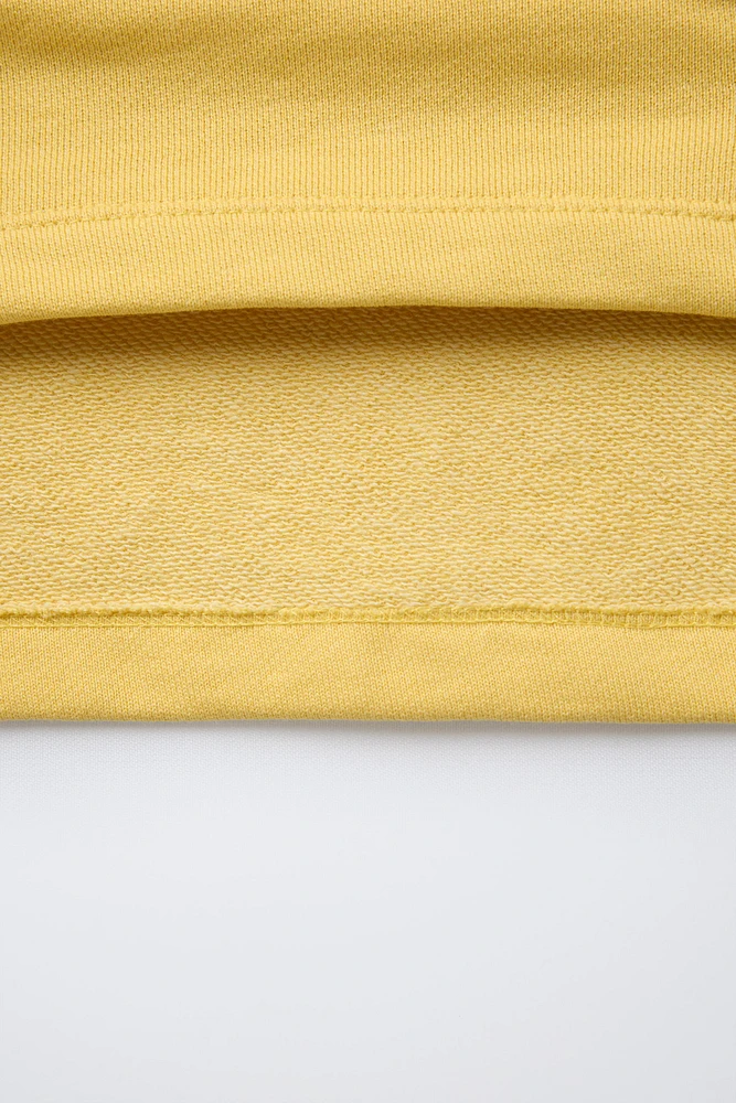 SWEAT À CAPUCHE ET MANCHES COURTES