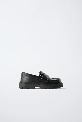 MOCASSINS CLOUTÉS