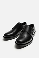 CHAUSSURES EN CUIR À BOUCLE