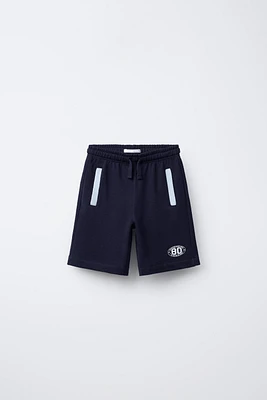 CONTRAST PIPING JOGGING SHORTS