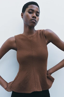 TEXTURED PEPLUM TOP