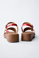 PATENT-FINISH CLOGS