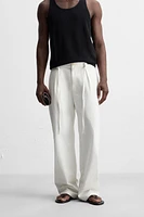 RELAXED FIT PLEATED PANTS