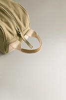 TROUSSE DE TOILETTE SIMPLE DÉTAIL CUIR