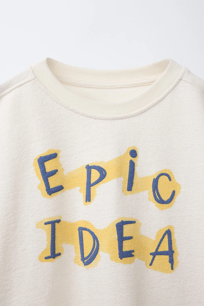 TEXTURED RAISED TEXT T-SHIRT