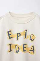 TEXTURED RAISED TEXT T-SHIRT