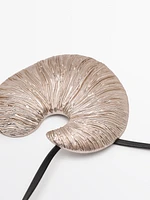 Necklace with fossil piece pendant