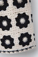 PANTALON EN MAILLE À FLEURS AU CROCHET