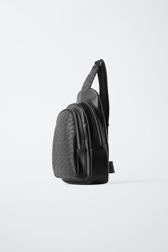 EMBOSSED CROSSBODY BACKPACK