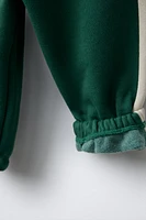 PANTALON DE JOGGING AVEC INSCRIPTION BRODÉE