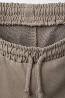 PANTALON BIMATIÈRE AVEC ÉTIQUETTE