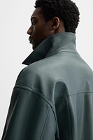 BLOUSON EN MATIÈRE SYNTHÉTIQUE