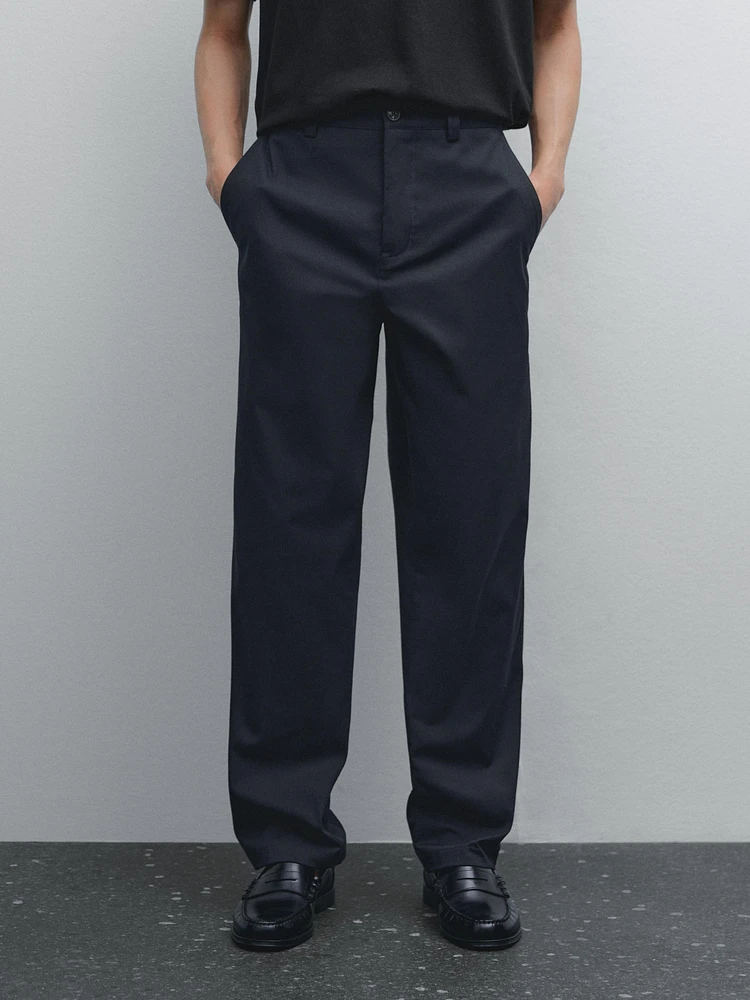 Slim fit cotton blend trousers.
