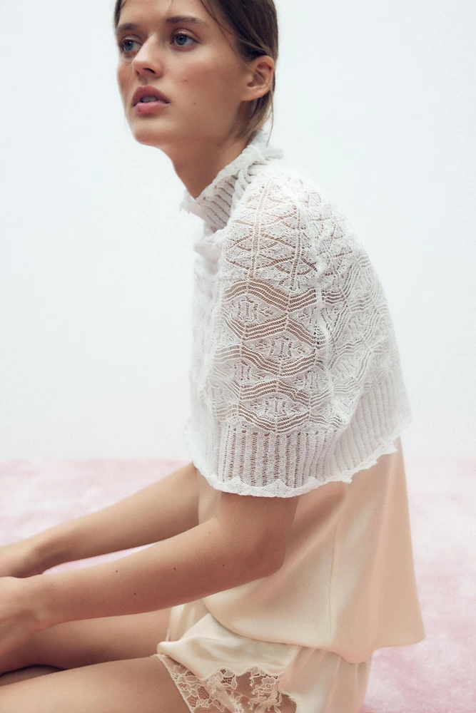 KNIT CAPE