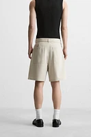 PLEATED BERMUDA SHORTS WITH BELT