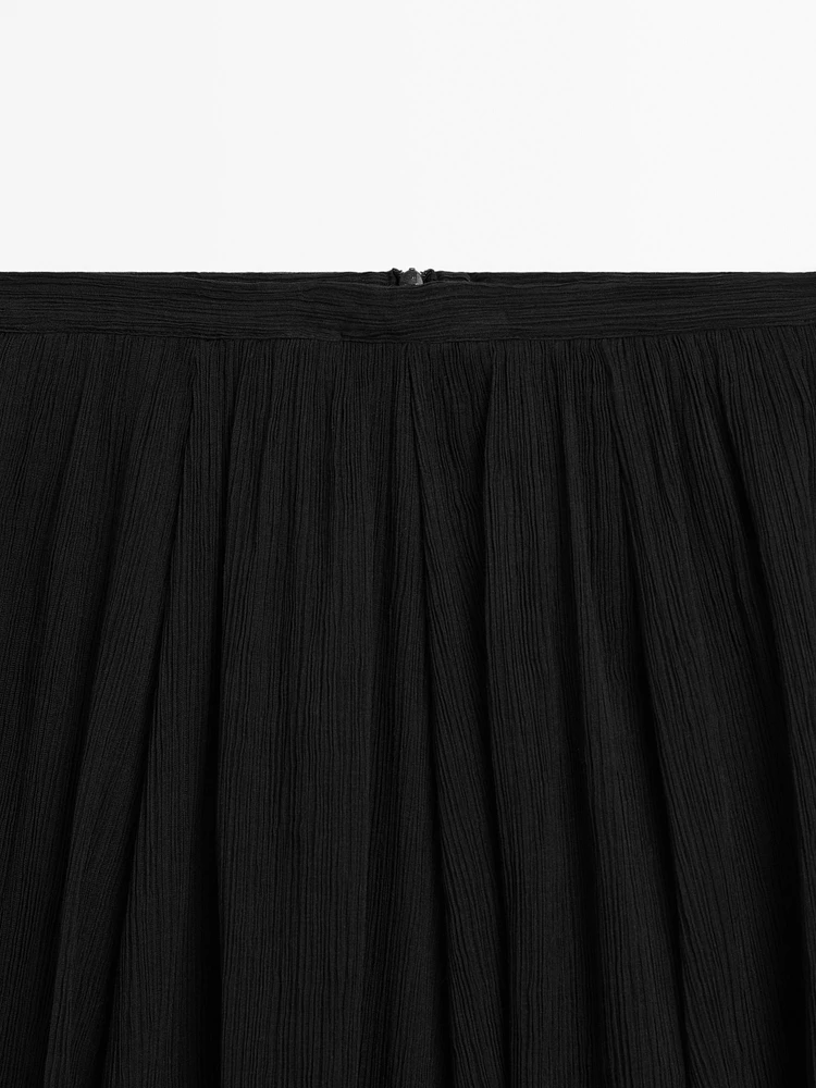 Jupe midi plissée volume