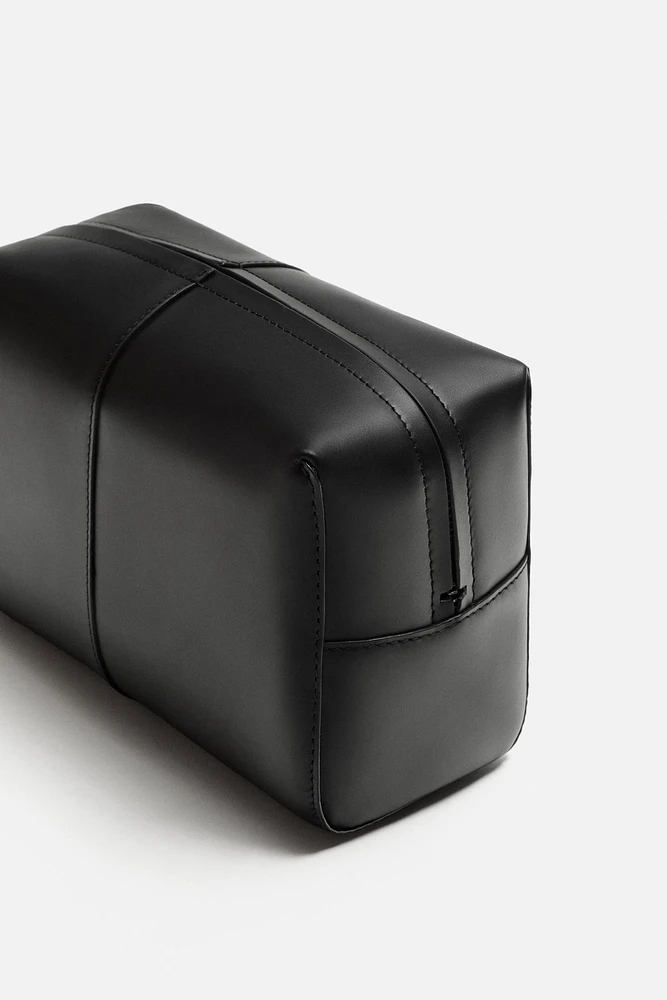 TROUSSE EN CUIR