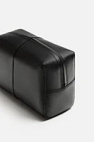 TROUSSE EN CUIR