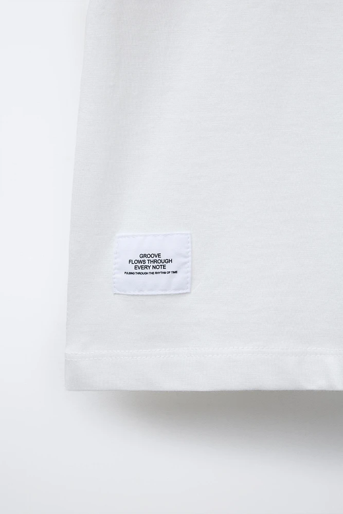 TEXT AND LABEL PRINTED T-SHIRT