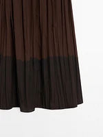 Long flowing pleated skirt