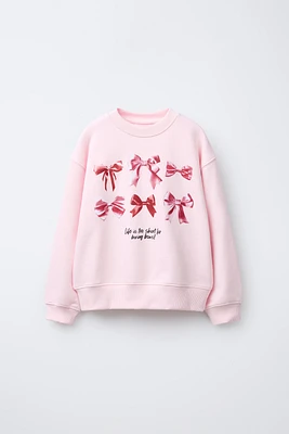 BOW PRINT SWEATSHIRT