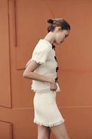 FRAYED MINI SKIRT