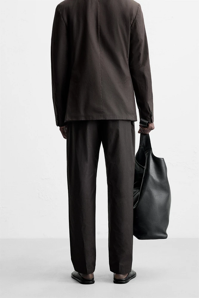 PANTALON DE COSTUME EFFET CIRÉ