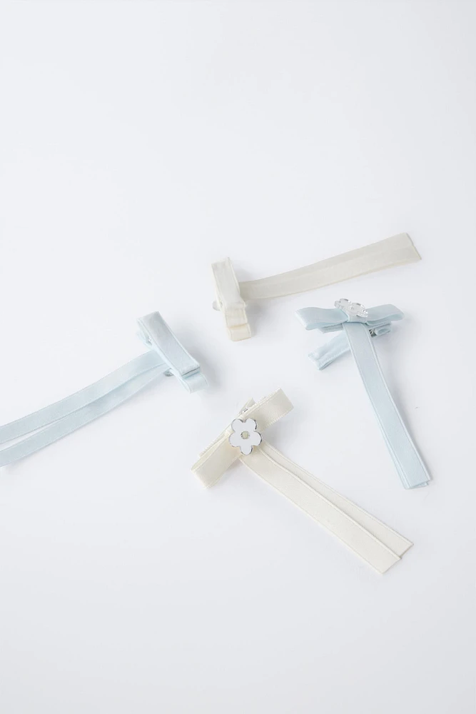 LOT DE QUATRE PINCES CLIP LACET FLEUR
