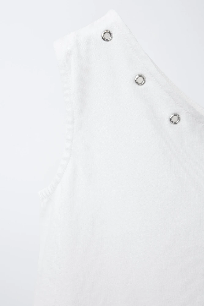 HAUT ASYMÉTRIQUE À ŒILLETS