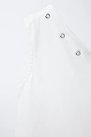 HAUT ASYMÉTRIQUE À ŒILLETS