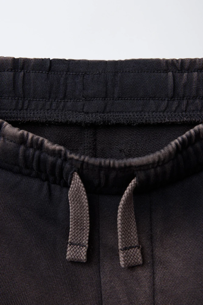 WORN EFFECT PLUSH SHORTS