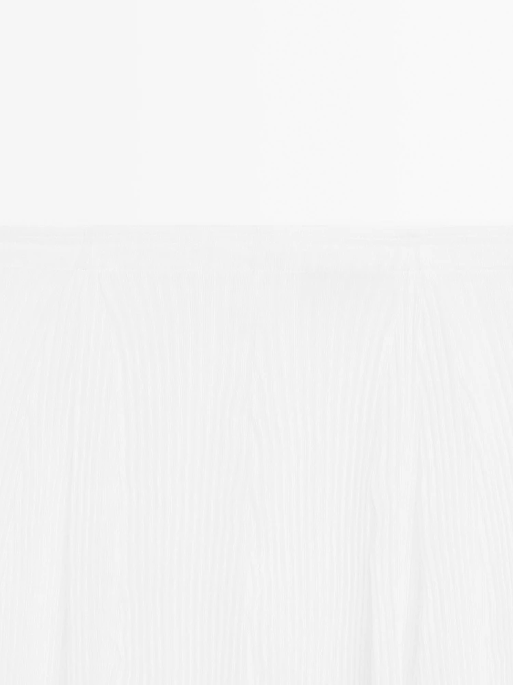 Pleated skirt with godet detail