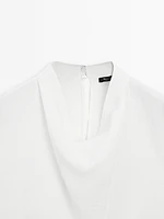 Flowing blouse with draped collar