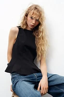 TOP PÉPLUM À LACETS
