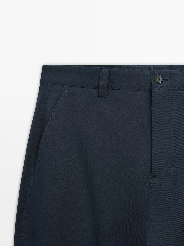 Slim fit cotton blend trousers.