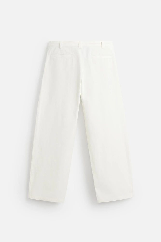 RELAXED FIT PLEATED PANTS