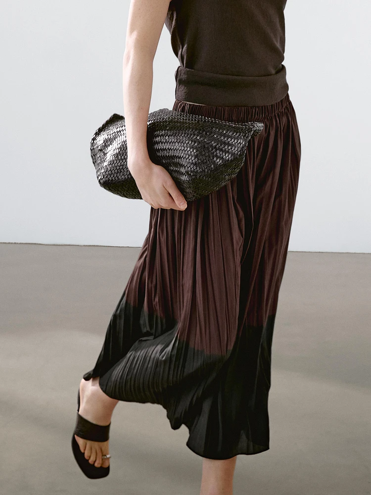 Long flowing pleated skirt