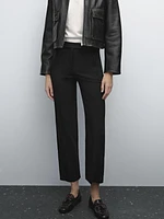 Pantalon avec boutons dans le bas