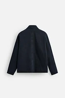 VESTE EN JEAN COUPE CARRÉE