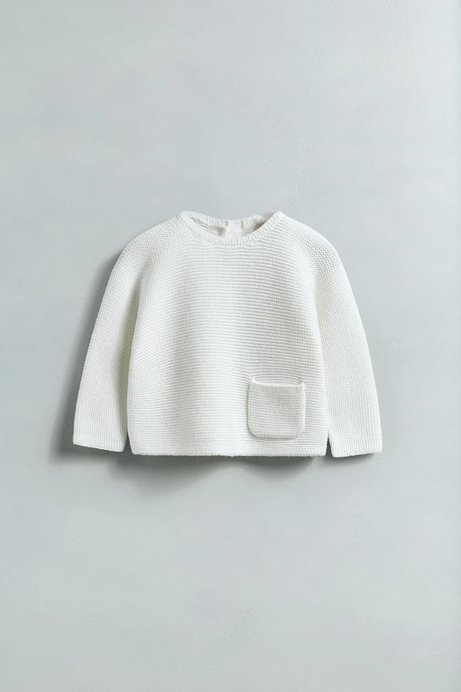 PULL EN MAILLE AVEC POCHE