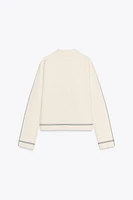 VESTE EN MAILLE À LISERÉS